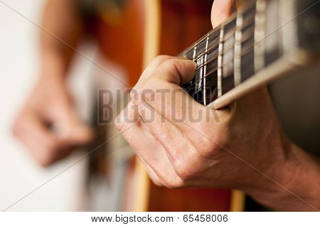Playing a 12 string acoustic guitar