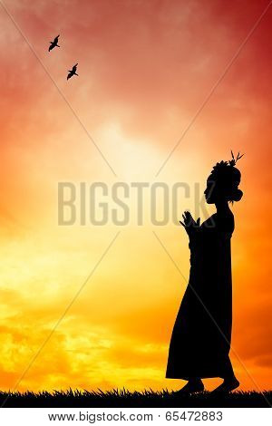 Woman Dancing Thai Dance At Sunset
