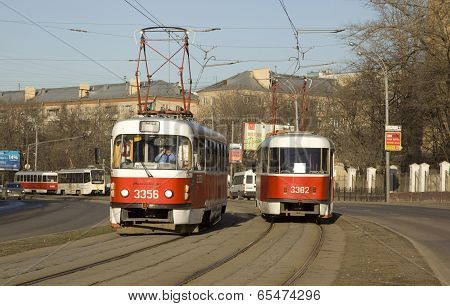 Moscow, Russia - March 27 2014: Two Old Red Czech Trams On Novoshukinskaya Street In Moscow, Shukino