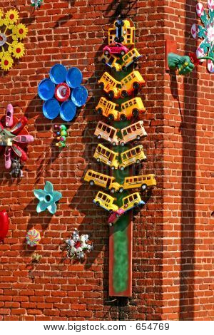 Whimsical Sculptures On Wall