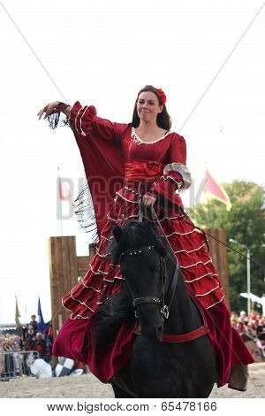Riga, Latvia - August 21: Camilla Naprous From The Devils Horsemen Stunt Team Riding Beautiful Black