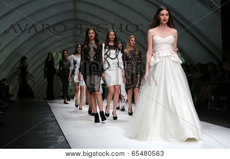 ZAGREB, CROATIA - MAY 09: Fashion model wearing clothes designed by Avaro Figlio on the Zagreb Fashion Week on May 09, 2014 in Zagreb, Croatia.