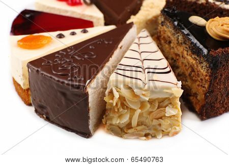 Assortment of pieces of cake, isolated on white