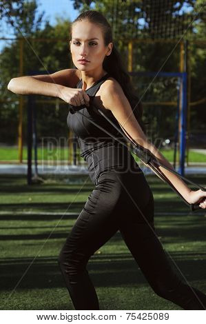 Sports Girl Practice With Espander On The Street