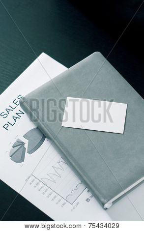 Sales Plan With A Business Card And Luxury On The Table
