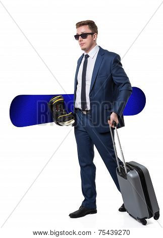 Confident businessman going for a winter break