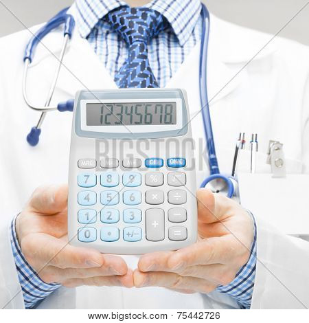 Doctor Holdling In His Hand Calculator - Studio Shoot