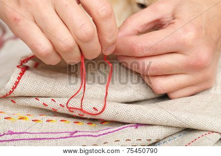 Woman Hands Sewing With Muline