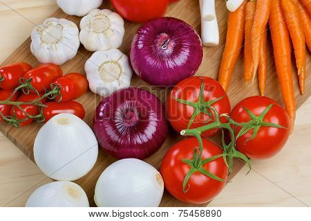 Fresh vegetables on a wooden board