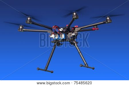 Dlying drone isolated on blue