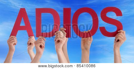 People Holding Straight Spanish Word Adios Means Goodbye Blue Sky