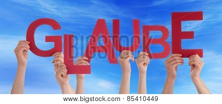 People Holding German Word Glaube Means Belief Blue Sky