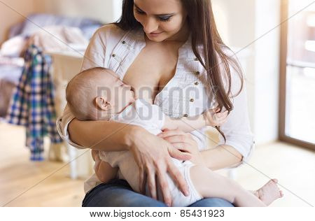 Mother breastfeeding her baby