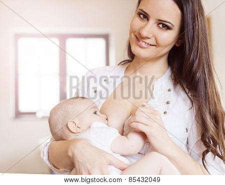 Mother breastfeeding her baby