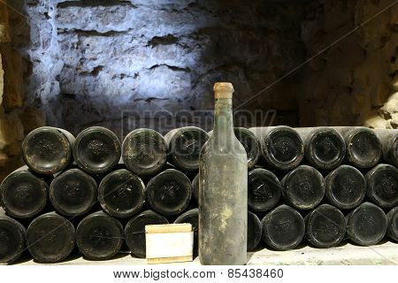 Old Bottle Of Wine In The Cellar Of The Winery Ancient Wine Bottles In The Cellar Wineryred Wine Of