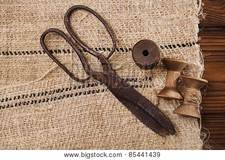 really antique iron scissors with spools on old grain sacking linen Completely hand made  handwoven and homespun