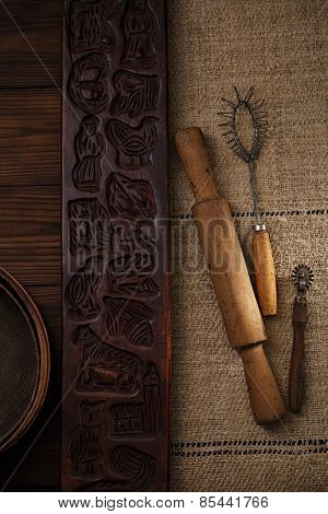 real vintage unique wooden baking utensils on old grain sacking linen Completely hand made  handwoven and homespun
