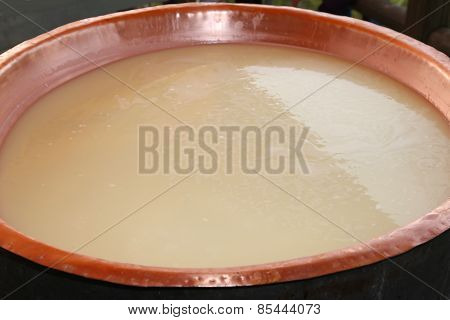 Milk In The Copper Pot For Making Cheese