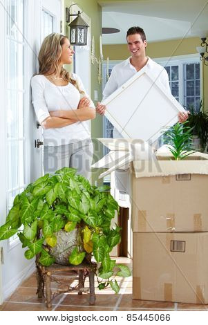 Young loving couple at new home. Relationship.