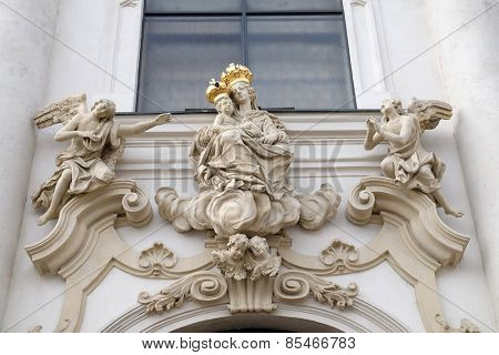 GRAZ, AUSTRIA - JANUARY 10, 2015: Virgin Mary with baby Jesus on the portal of Mariahilf church in Graz, Styria, Austria on January 10, 2015.