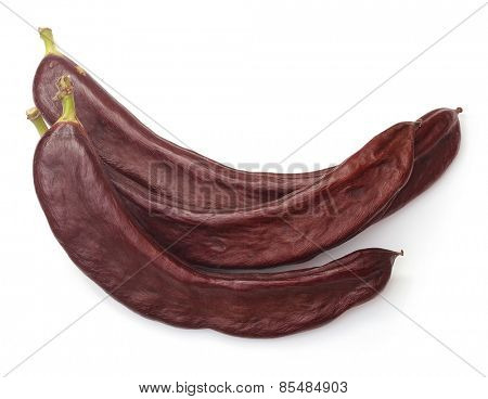 Carob pod  isolated on a white background