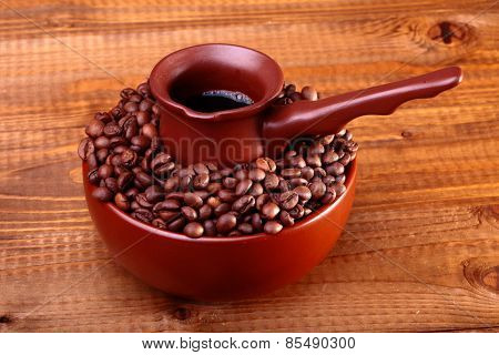 Coffee Beans In Bowl With Finjan