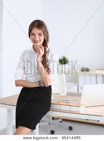 Attractive businesswoman stnding