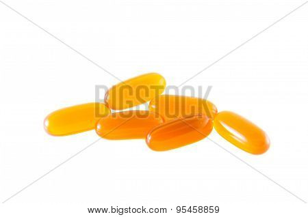Yellow Medicine Capsule On Isolated Background