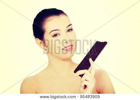 Beautiful woman holding a waffer