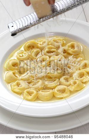 tortellini in brodo, ring shaped pasta in broth, italian emilia romagna soup cuisine