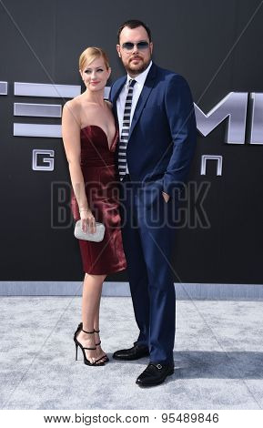 LOS ANGELES - JUN 28:  Beth Behrs & Michael Gladis arrives to the 