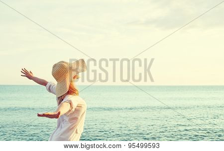Happy Woman In Hat Is Back  Opened His Hands, Enjoys Sunset