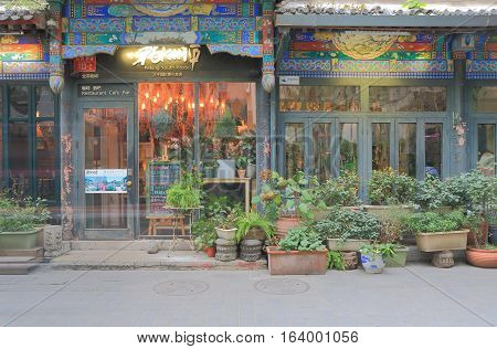 BEIJING CHINA - OCTOBER 27, 2016: Nanluoguxiang lane. Nanluoguxiang lane has become a popular tourist destination with restaurants and bars.