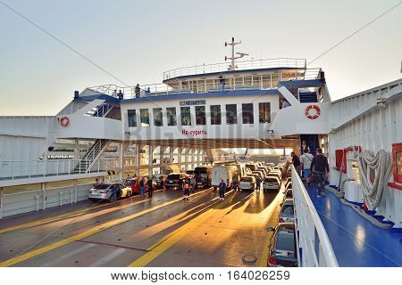 Download Car Ferry On The Ferry Crossing To The Crimea At Sunset