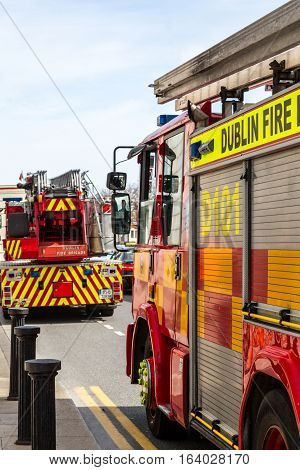 Two fire engines on city street.
Dublin, Ireland - April 21, 2016: Two fire engines from Dublin fire Brigade on a street in Dublin during emergency rescue.
Dublin fire Brigade engines on street.