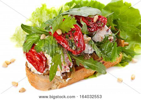 Fresh bruschetta with cheese and sun-dried tomatoes