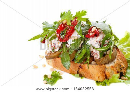 Fresh bruschetta with cheese and sun-dried tomatoes