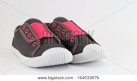 Children Sneakers On White