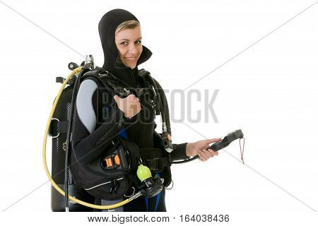 Young diver cheking pressure by manometer before dive