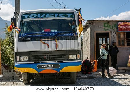 Jomsom, Nepal - October 19: People buying ticket and waiting for bus to arrive, on October 19 2015 in Jomsom Nepal.
