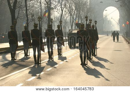 BUCHAREST ROMANIA - DECEMBER 1 2011: Military are marching during a military parade in Bucharest. More than 3000 soldiers and personnel from security agencies take part in the massive parades on National Day of Romania.