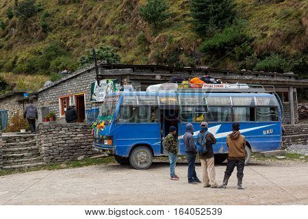 Jomsom, Nepal - October 19: People having a rest from bus ride, on October 19 2015 in Jomsom Nepal.
