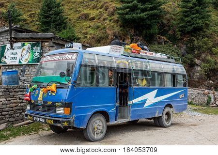 Jomsom, Nepal - October 19: People having a rest from bus ride, on October 19 2015 in Jomsom Nepal.