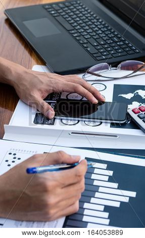 Business Workers Discussing Digital Graphs And Diagrams Indicating Progres.