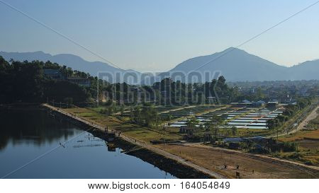 Fish farm near Pokhara Nepal. Dam of lake Begnas Tal.