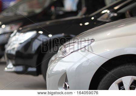 Car headlamp. Part of car at dealership salon