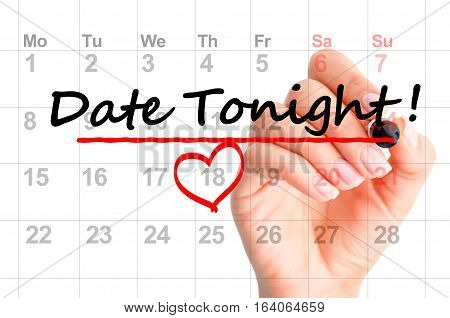 Date tonight marked on calendar by woman hand