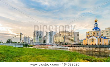 Belgorod cityscape. Pedestrian bridge over the river 