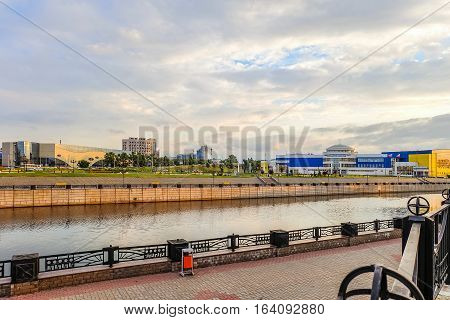 BELGOROD RUSSIA - JULY 04 2016: Belgorod cityscape. View from the embankment of river Vezelka at training facility Svetlana Khorkina (building in Belgorod State University complex) and avenue of Bohdan Khmelnytsky.