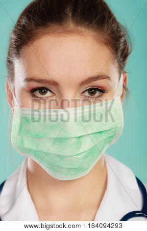 Portrait Of Female Doctor In Mask.